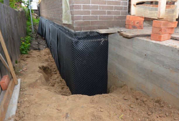 SJ Waterproofing Pros technician performing targeted Sump Pump Installation assessment in Whitelaw, WI